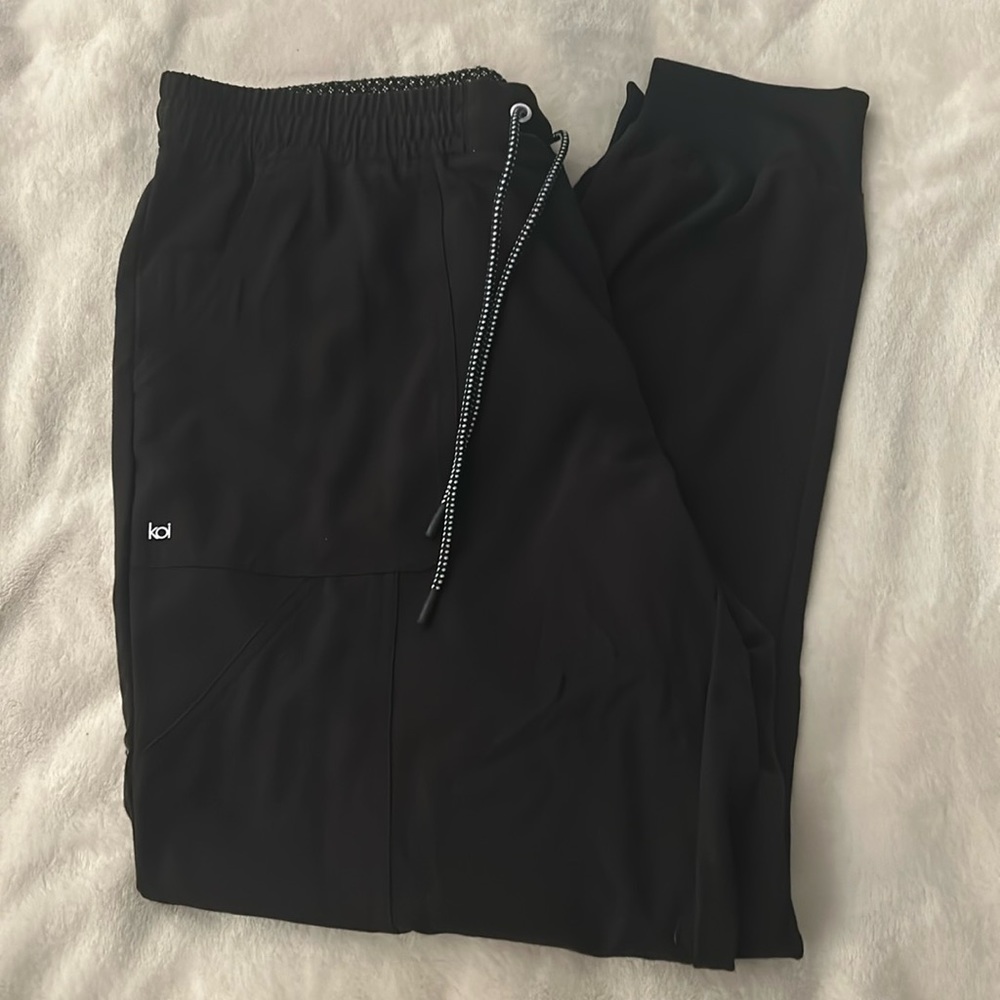 Woman’s Black Koi next gen joggers and top. Worn once.